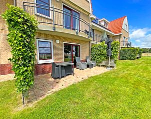 Uitzicht vanaf Appartement Bos en Duin 37, De Dennen, Texel op het omliggende landschap en natuur.
