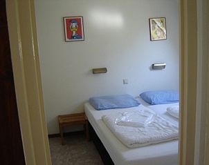 Gemtliches Schlafzimmer im Ferienhaus Gortersmient 282, De Dennen, Texel, ideal fr einen erholsamen Schlaf auf den Watteninseln.