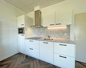 Fully equipped kitchen in Apartment Bos en Duin 02, Texel with clean lines and modern appliances.