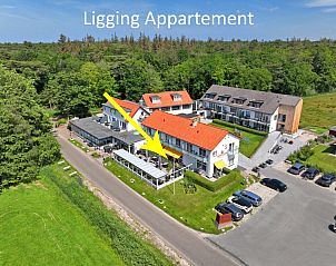 Aerial view of Apartment Bos en Duin 02, De Dennen, Texel, surrounded by nature and close to amenities.