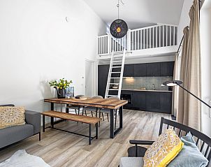 Stylish dining room and kitchen in vacation home Tormentil, located in De Dennen, Texel.