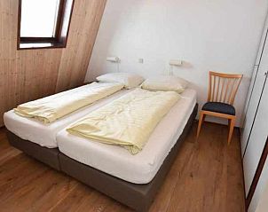 Gezellige tweepersoonsslaapkamer in vakantiehuis Gortersmient 306, De Dennen, Texel, Bungalowpark Gortersmient.