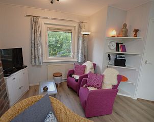 Knusse zithoek in Tempelierweg 32 - Bergland, Texel met moderne inrichting.