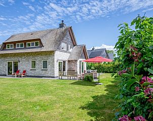 Bungalowpark 't Hoogelandt - Villa De Rode H in De Dennen, Texel mit groem Garten und Terrasse.