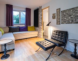 Gemtlicher Aufenthaltsraum in der Villa De Rode H, Bungalowpark 't Hoogelandt, De Dennen, Texel.