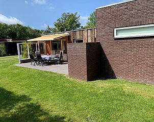 Terrace of vacation home Hesselte in De Dennen, Texel, with sunny location.