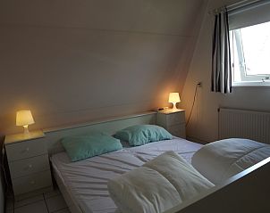 Kche im Ferienhaus Gortersmient 358, De Dennen, Texel mit Essecke und modernen Annehmlichkeiten.