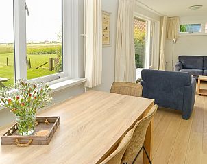 Essecke mit Aussicht im Ferienhaus 't Wambas, De Dennen, Texel, Waddeninseln.