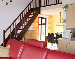 Trap naar bovenverdieping in Vakantiehuis Gortersmient 300, De Dennen, Texel. Gezellig vakantiehuis op de Waddeneilanden.