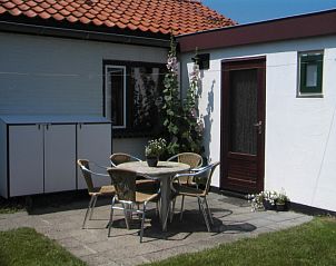 Sunny terrace at Langsteert vacation home, De Dennen, Texel, Wadden Islands.