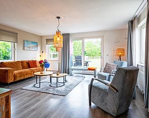 Gezellige woonkamer in Wulpenweid 12 de Meeuw vakantiehuis in De Dennen Texel.