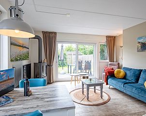 Gezellige woonkamer in Wulpenweid 14 Zeehond vakantiehuis, De Dennen, Texel.