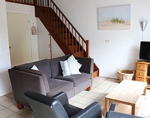 Comfortable sitting area in Holiday Home Gortersmient 290, De Dennen, Texel, with a cozy atmosphere.