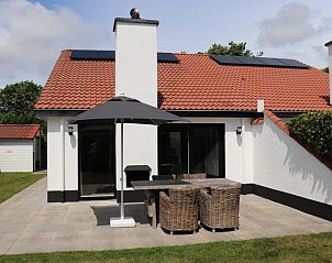 Gemtliche Terrasse im Ferienhaus Gortersmient 302 in De Dennen, Texel.