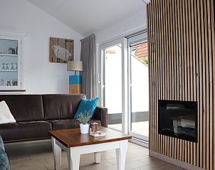 Gemtliche Sitzecke im modern eingerichteten Ferienhaus Gortersmient 302, De Dennen, Texel.