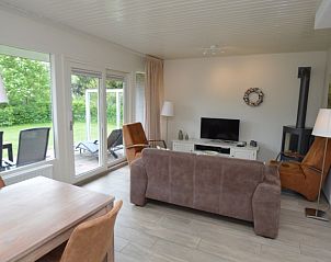 Gemtliches Wohnzimmer des Ferienhauses Tempelierweg - Kogermient 11 in De Dennen, Texel.