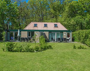 Bollenveld - de Iris vakantiehuis in De Dennen, Texel met ruime tuin en groene omgeving.