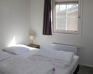 Komfortables Schlafzimmer im Ferienhaus Ekster, De Dennen, Texel, fr eine gute Nachtruhe auf den Watteninseln.