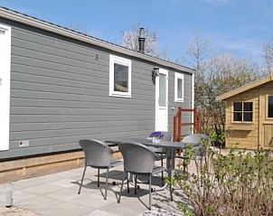 Vakantiepark de Bremakker, Texel: Holiday home with terrace and garden house in De Dennen.