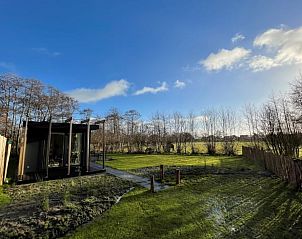 Uitgestrekt uitzicht vanaf Huisje in Formerum Terschelling, met prachtige natuur op de Waddeneilanden.