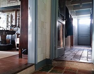 Gang met tegelvloer in Vakantiehuis in Formerum, Terschelling op de Waddeneilanden.