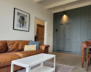 Cozy living room in Holiday Home in Formerum Terschelling with comfortable seating area.