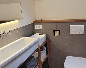 Neatly furnished bathroom in Holiday Home in Formerum Terschelling with modern amenities.