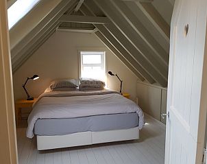 Cozy bedroom with skylight in Holiday home in Formerum Terschelling.