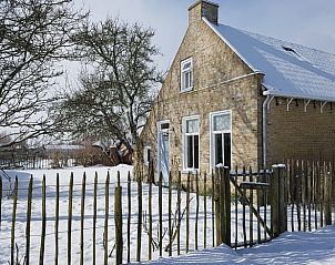 Vacation home in Formerum Terschelling surrounded by snow in winter.
