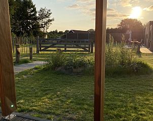 Zonsondergang uitzicht vanaf het terras van ZONICE chalet in Formerum, Terschelling.