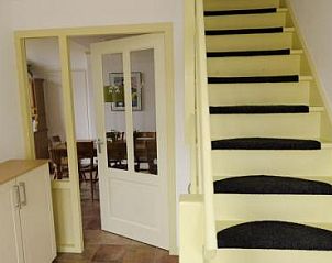 Trap en eetkamer in Boerderij vakantiehuis, Hoorn, Terschelling, Waddeneilanden.