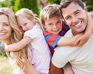 Gezin geniet van vakantie bij Carpe Diem vakantiehuis, West, Terschelling, Waddeneilanden.