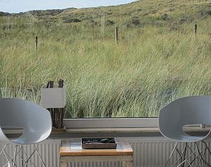 Sitzecke mit Blick auf die Dnen im Ferienhaus Nij Jit, Midsland aan Zee, Terschelling.