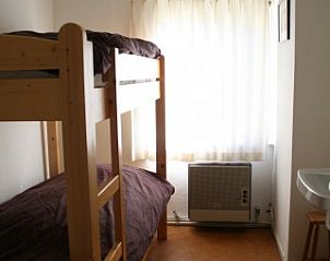 Knusse slaapkamer met stapelbed in Botter vakantiewoning Midsland Noord Terschelling