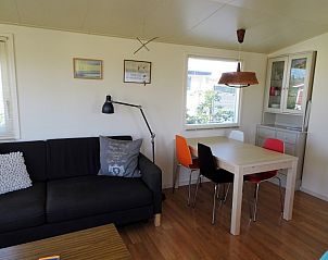 Stijlvolle woonkamer van De Doorloper vakantiehuis in Midsland Noord, Terschelling.