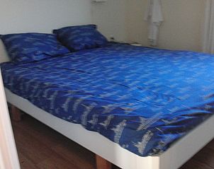 Comfortabele slaapkamer in De Doorloper vakantiehuis, Midsland Noord, Terschelling.