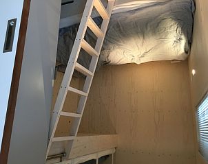 Knusse slaapzolder in Florizand, Midsland Noord, Terschelling, met comfortabele bedden.