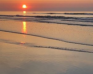 Adembenemende zonsondergang bij Terschelling, perfect voor gasten van Chalet DOMETO.