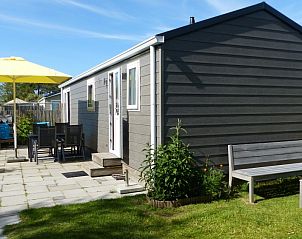 Gezellig terras bij 't Snitserleven Chalet, vakantiehuis op Terschelling in Midsland Noord.