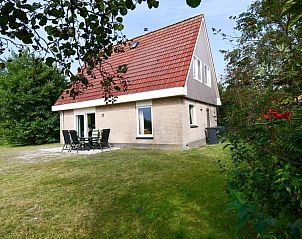 Vakantiehuis De Grutto in Midsland Noord, Terschelling, met gezellige buitenruimte.