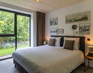 Slaapkamer met uitzicht in Noordhoek vakantiehuis, Midsland Noord, Terschelling.