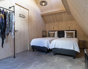 Zolderkamer met twee bedden in Noordhoek vakantiehuis, Midsland Noord, Terschelling.