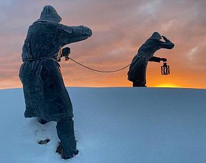 Snow landscape with images at sunset on Ameland, close to De Dijkwachter, vacation home in Ballum.