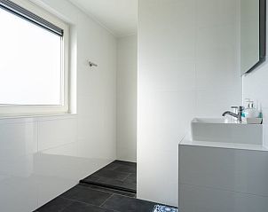 Spacious shower in Holiday home in Ballum, Ameland, with modern amenities.