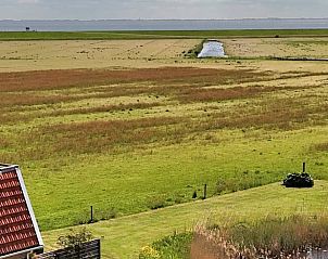 View of the fields from Holiday home in Ballum, Ameland.