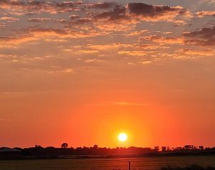 Breathtaking sunset at Holiday home in Ballum, Ameland.