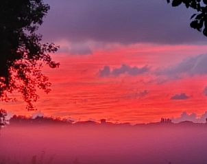 Red sky and misty morning at Holiday Home in Ballum, Ameland.