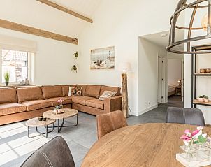 Gezellige woonkamer in Chill op Ameland vakantiehuis Ballum.
