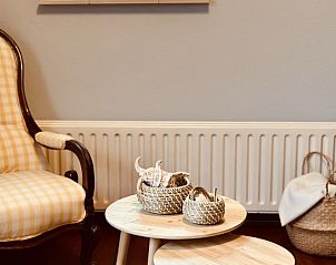 Stijlvolle decoratie in woonkamer van Akkerduin vakantiehuis in Ballum, Ameland.