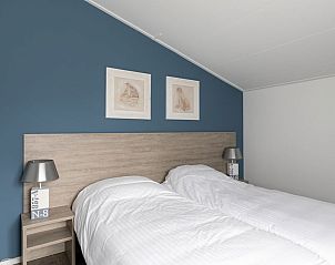 Kindvriendelijke stapelbedden in Vakantiewoning De Las, Buren, Ameland, ideaal voor gezinnen op de Waddeneilanden.